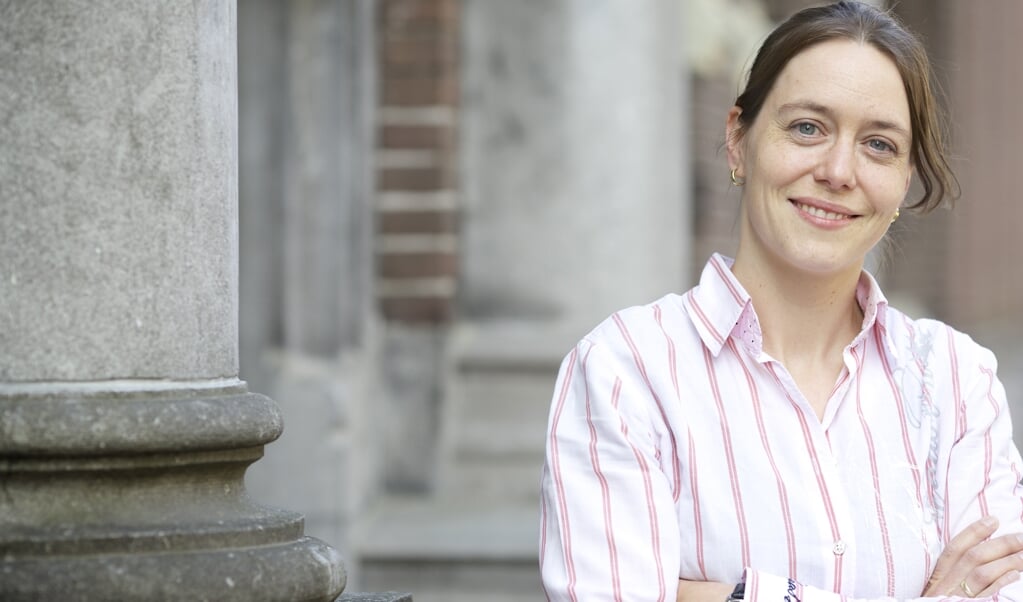 Promovenda Myriam Klinker-De Klerck: ‘De apostel Paulus wil dat christenen geen weerstand oproepen bij buitenstaanders,
zodat ze de voortgang van het evangelie niet in de weg staan.’ (beeld Dick Vos)
