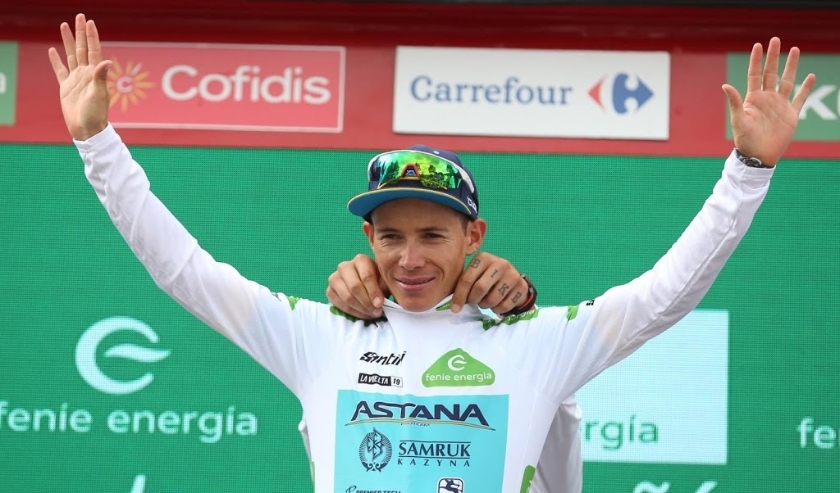 2019-09-12 12:06:23 epa07837823 Colombian rider Miguel Angel Lopez of Astana Pro team celebrates on the podium wearing the best young rider's white jersey after finishing the 18th stage of the Vuelta a Espana cycling race, over 177.5km from Colmenar Viejo ( beeld anp)