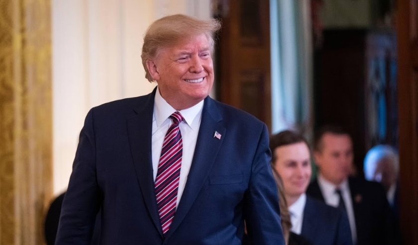 2019-12-11 15:45:47 epa08063982 US President Donald J. Trump enters a Hanukkah reception in the East Room of the White House in Washington, DC, USA, 11 December 2019. Trump used the occasion to sign an Executive Order to 'further the fight against the ris ( beeld anp)