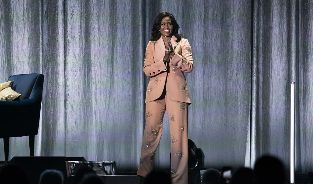 Het kostte Michelle Obama strijd om als zwarte vrouw in de Verenigde Staten een eigen loopbaan op te bouwen en na het succes daarvan los te komen van de stempels ex-first lady en ‘boze zwarte dame’. (beeld afp / Martin Sylvest)