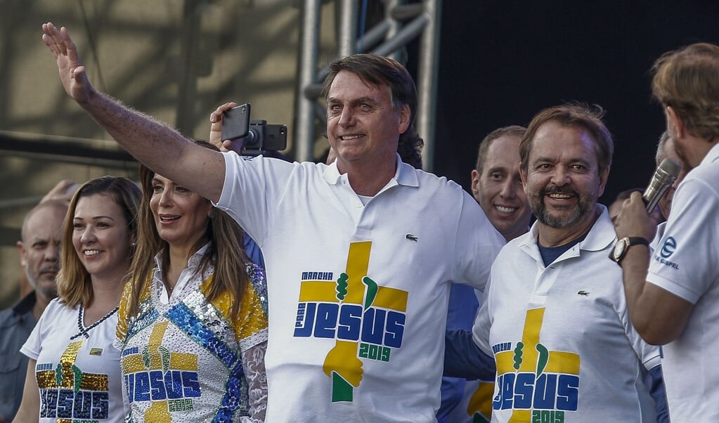 President Jair Bolsonaro van Brazilië tijdens de Mars voor Jezus in São Paulo, in juni vorig jaar. (beeld afp / Miguel Schincariol)