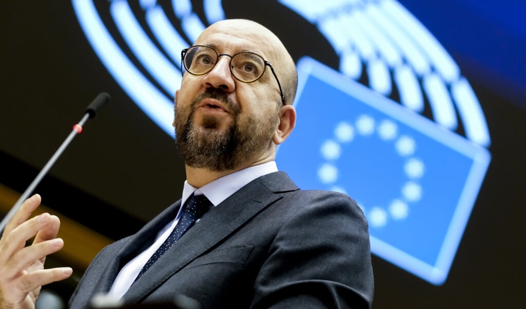 <p>EU-president Charles Michel: handen ineenslaan om pandemie te verslaan.</p> (beeld afp / Olivier Hoslet)