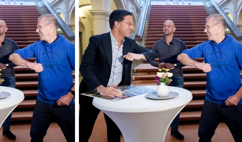 DEN HAAG - Premier Mark Rutte is in gesprek met horecaondernemers Bert van Zijtveld (midden) en Alain Schepers. Van Zijtveld en Schepers begonnen tien dagen eerder een voettocht vanuit Ruurlo in de Achterhoek naar Den Haag, om aandacht te vragen voor de horeca. ANP SEM VAN DER WAL (beeld anp / Sem van der Wal)