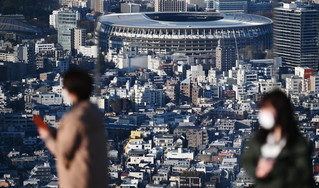 Het nieuwe Nationale Stadion, het hart van de Olympische Spelen in Tokio. (beeld afp / Charly Triballeau)
