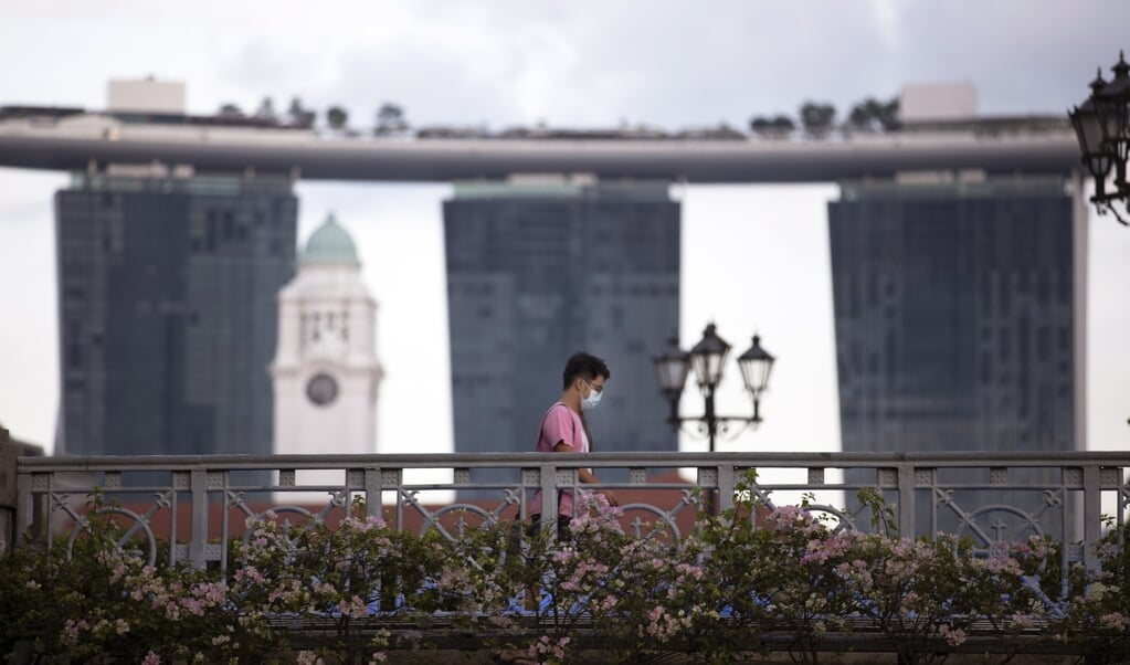 Onder meer Singapore is al langere tijd leidend door de aanpak van het coronavirus. (beeld epa / How Hwee Young)