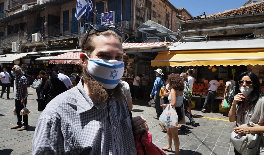 Kleine minderheden in Israël worden extra hard geraakt door de coronacrisis. (beeld afp / Menahem Kahana)