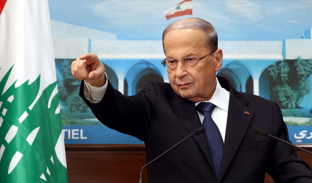 <p>De Libanese president Michel Aoun tijdens zijn toespraak in het presidentiële paleis. Als er geen regering komt, 'gaat ons land naar de hel', aldus Aoun</p> (beeld AFP/ Dalati and Nohra)