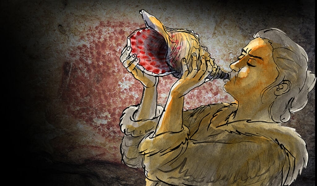 Reconstructie van een prehistorische muzikant die in de grot op de schelp blaast. (beeld Gilles Tosello)