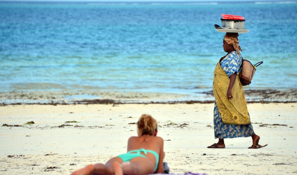 Met prachtige witte zandstranden, wuivende palmbomen en elke dag prachtig weer trekt het jaarlijks zeker een half miljoen toeristen. (beeld afp / Gabriel Bouys)