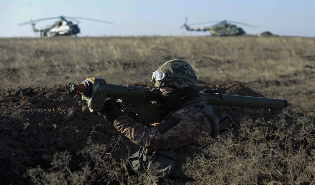 Oekraïense militairen op het grensgebied nabij de Krim. Sinds de annexatie van de Krim in 2014 is het onrustig langs de Europese oostgrens. (beeld afp / Sega Volskii)