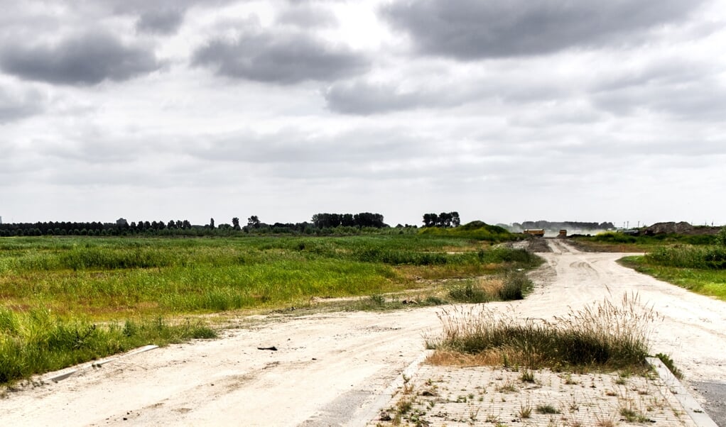 Iedereen is het erover eens dat Nederland meer woningen nodig heeft, maar de politieke partijen verschillen van mening over de vraag waar die woningen gebouwd moeten worden. (beeld anp / Koen van Weel)