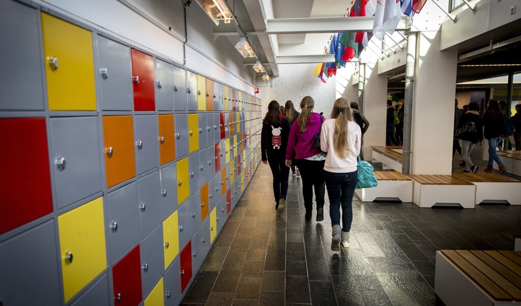 In veel gevallen mengen sociale groepen zich op school niet automatisch als ze zich in dezelfde ruimte bevinden. Daar is meer voor nodig. (beeld anp / Jerry Lampen)