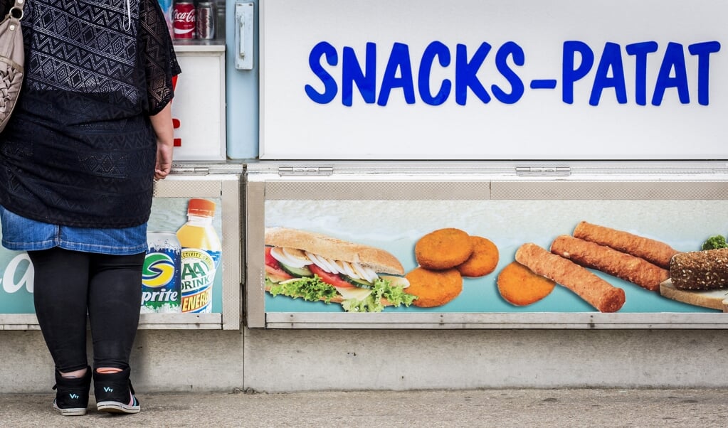 Bussemaker: 'Een suikertaks of een snackbar weren, kon de afgelopen jaren niet, omdat de individuele keuzevrijheid heilig was.' (beeld anp / Valerie Kuypers)