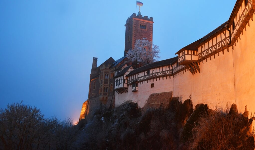 De Wartburg in Eisenach, waar reformator Maarten Luther bijna een jaar verbleef. (beeld afp / Jens Kalaene)
