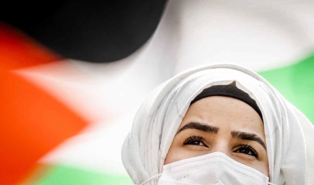 Een vandaag gehouden protest voor de bevrijding van Palestina op het Jaarbeursplein. De actie is bedoeld om solidariteit met de Palestijnse bevolking te tonen. ANP REMKO DE WAAL (beeld anp / Remko de Waal)