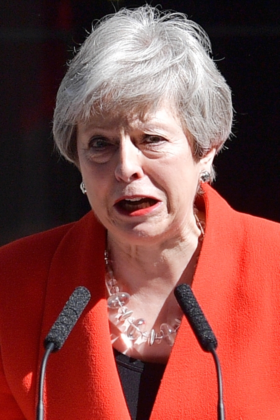 De Britse premier Theresa May voor haar ambtswoning bij de aankondiging van haar aftreden als leider van de Conservatieve Partij. (afp / Daniel Leal-Olivas)