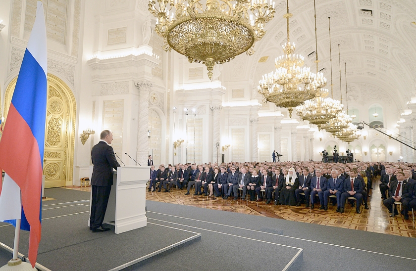President Vladimir Putin riep donderdag in zijn rede tot het Russische volk op tot een breed internationaal front tegen het terrorisme. (ap / Alexei Nikolsky)
