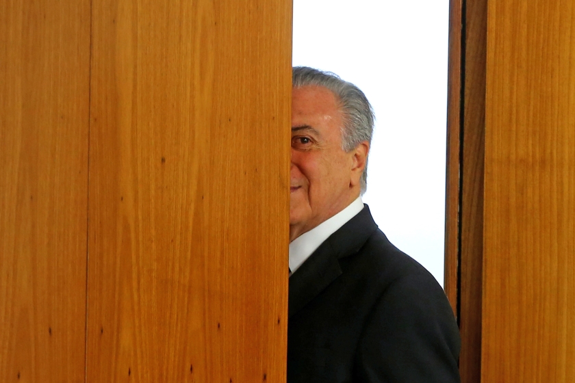 De kersverse president van Brazilië Michel Temer vertrok woensdag direct na zijn inauguratie direct naar China voor de bijeenkomst van de G20. Hij hoopt de wereld te laten zien dat de rust in zijn land is weergekeerd. (ap / Ailton de Freitas)