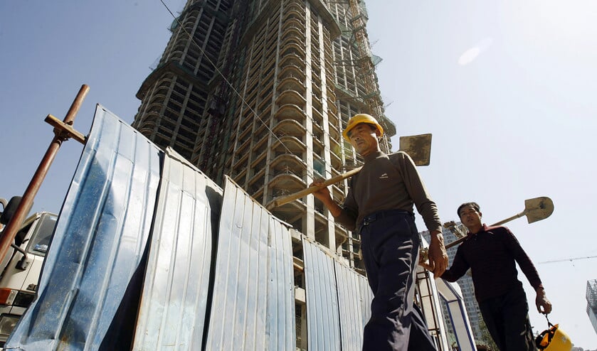 In Peking wordt volop aan een solide infrastructuur gewerkt, maar zal het Chinese project gaan lukken? (afp / Peter Parks)