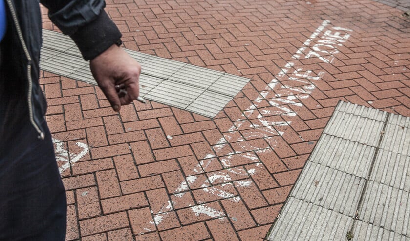 Het begin van de rookvrije zone van het Universitair Medisch Centrum Groningen, zoals die tot 31 december bestond. (Harry Cock)
